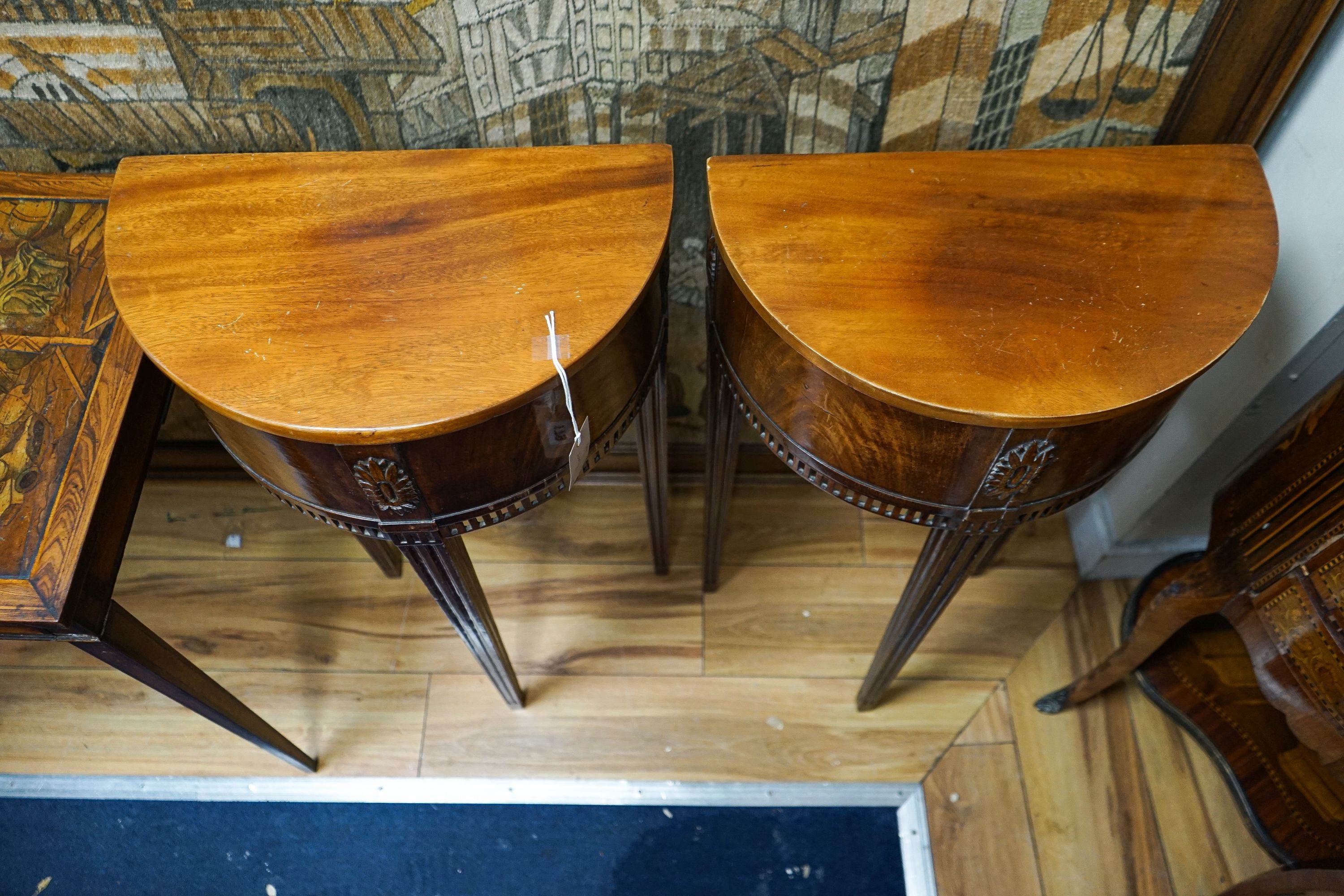 A pair of late 19th century Dutch mahogany demi lune console tables, width 42cm, depth 24cm, height 80cm